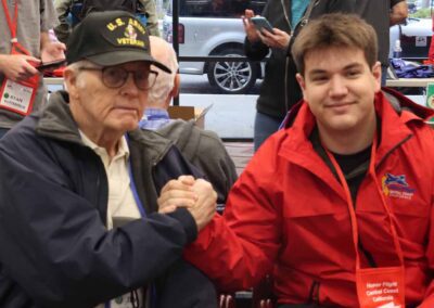 Veteran and guardian together at the airport before their Honor Flight journey.