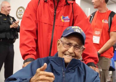 Veteran giving a thumbs up after returning from their Tour of Honor trip.